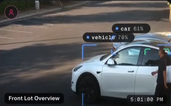 White Tesla at Front Lot Overview